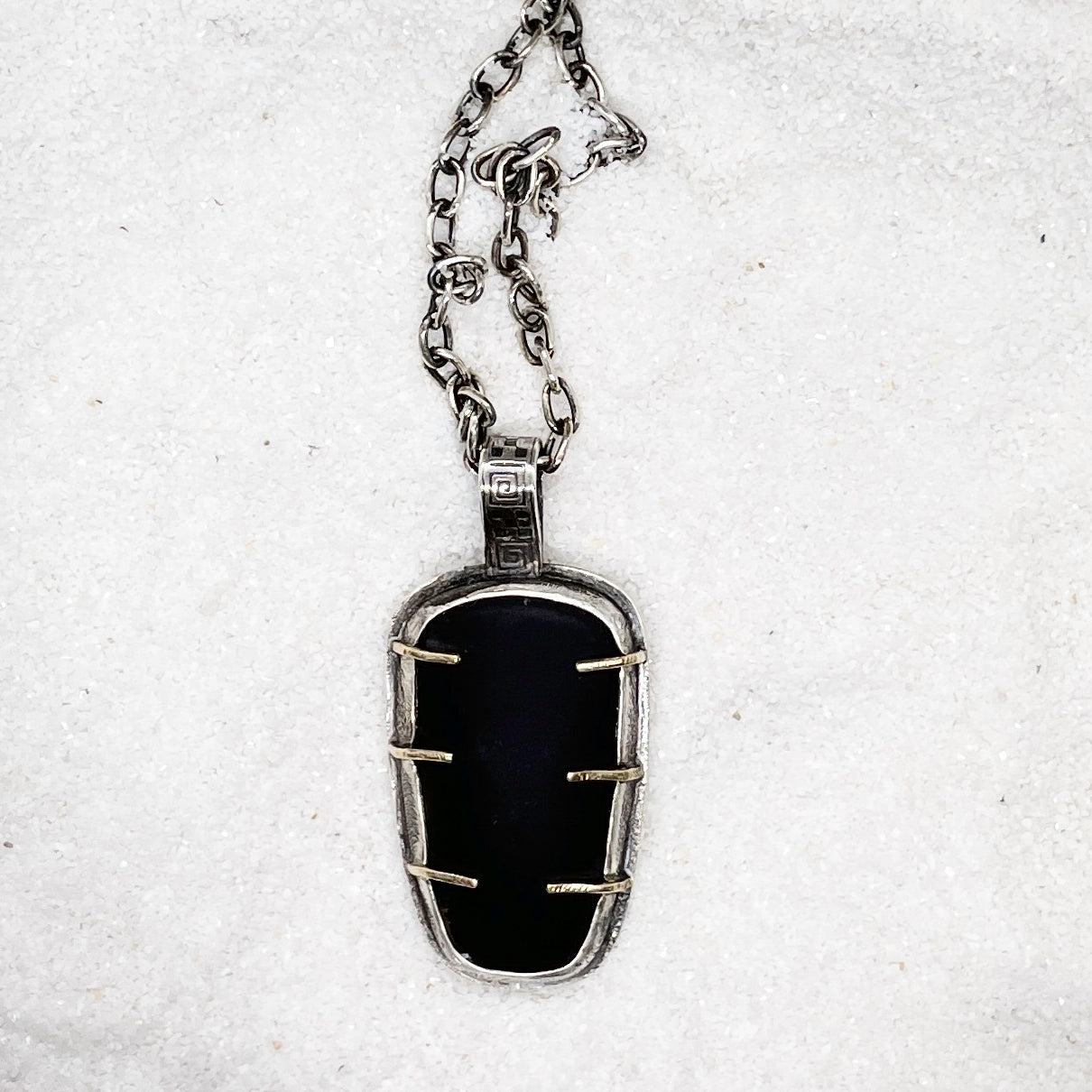 Caged Matt Black Obsidian Pendant