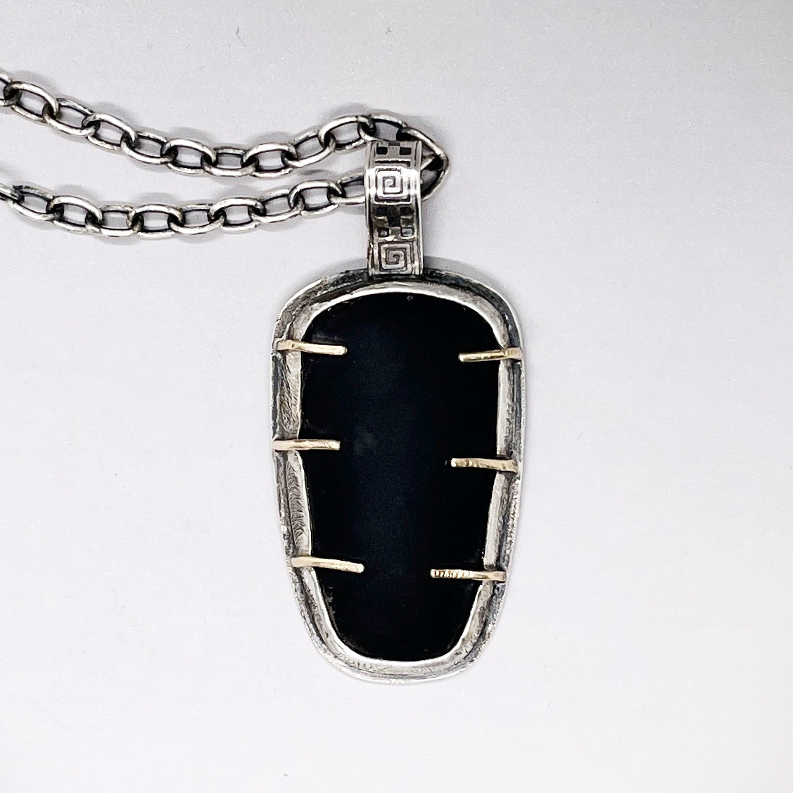 Caged Matt Black Obsidian Pendant